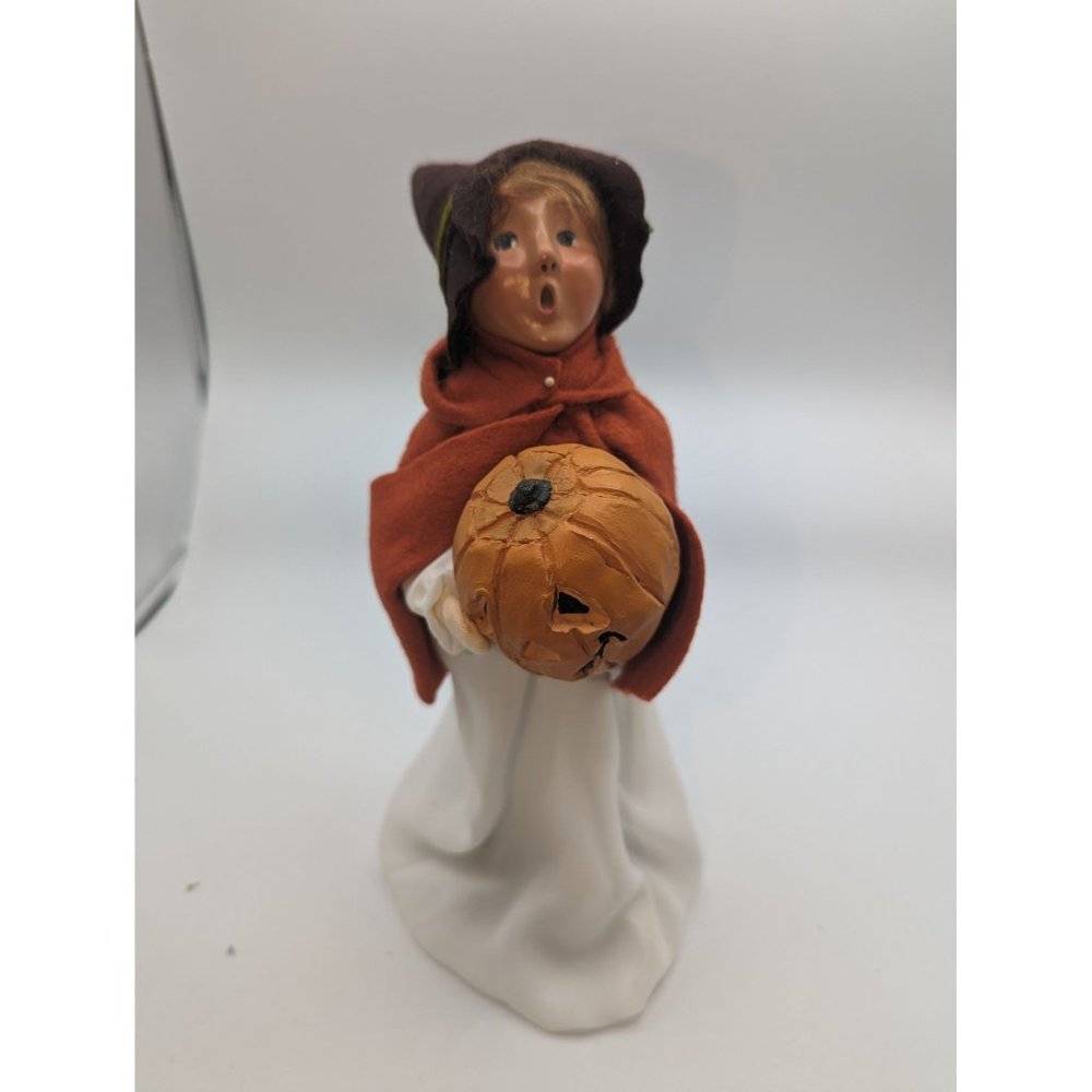 Byers' Choice Halloween Caroler Little Witch in White Dress with Pumpkin